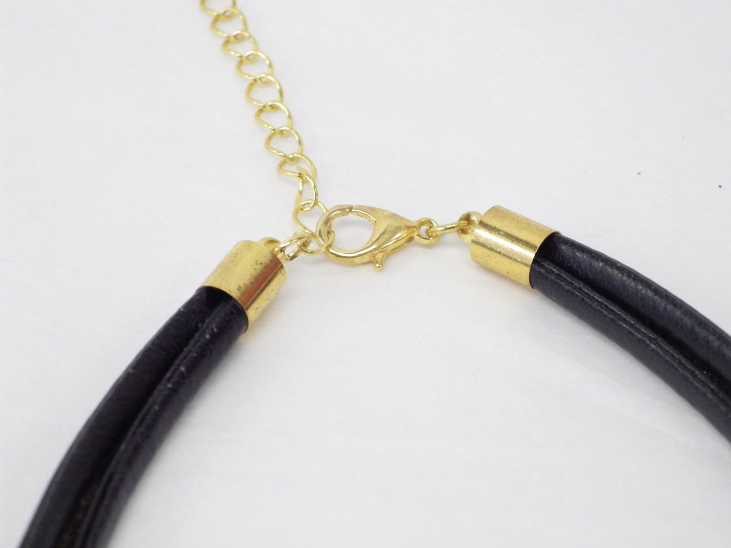 Collier/Bracelet noir et dorée plume - MJ Bijoux